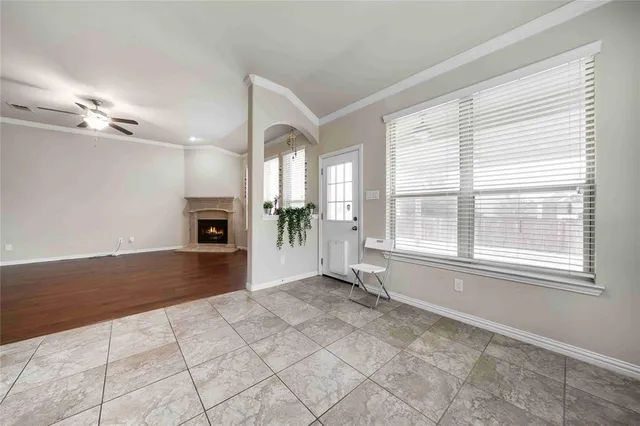 a kitchen with stainless steel appliances a stove top oven and cabinets