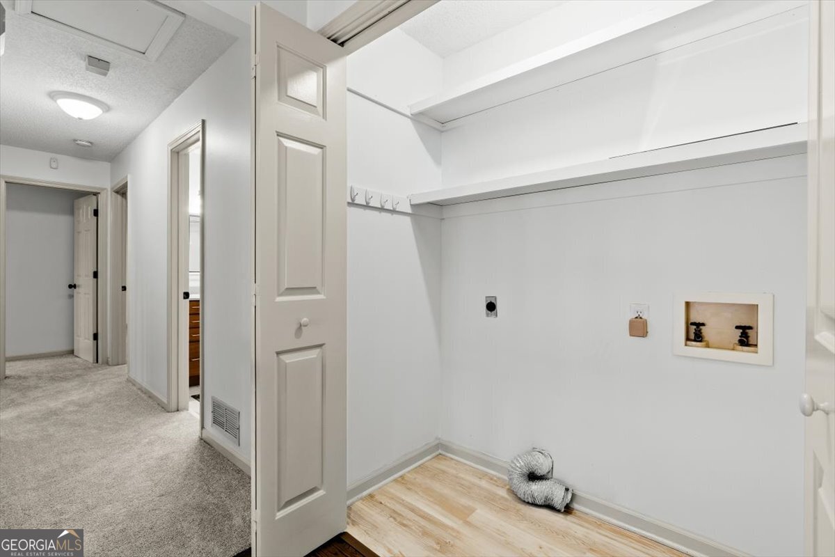 325 Almon Road Carrollton, GA 30117 - Photo 13 of 41 a view of a livingroom with wooden floor