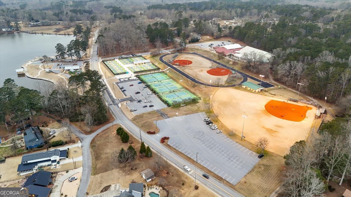 325 Almon Road Carrollton, GA 30117 - Photo 29 of 41 an aerial view of a swimming pool with outdoor seating