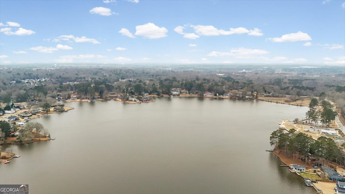325 Almon Road Carrollton, GA 30117 - Photo 35 of 41 a view of a lake with houses
