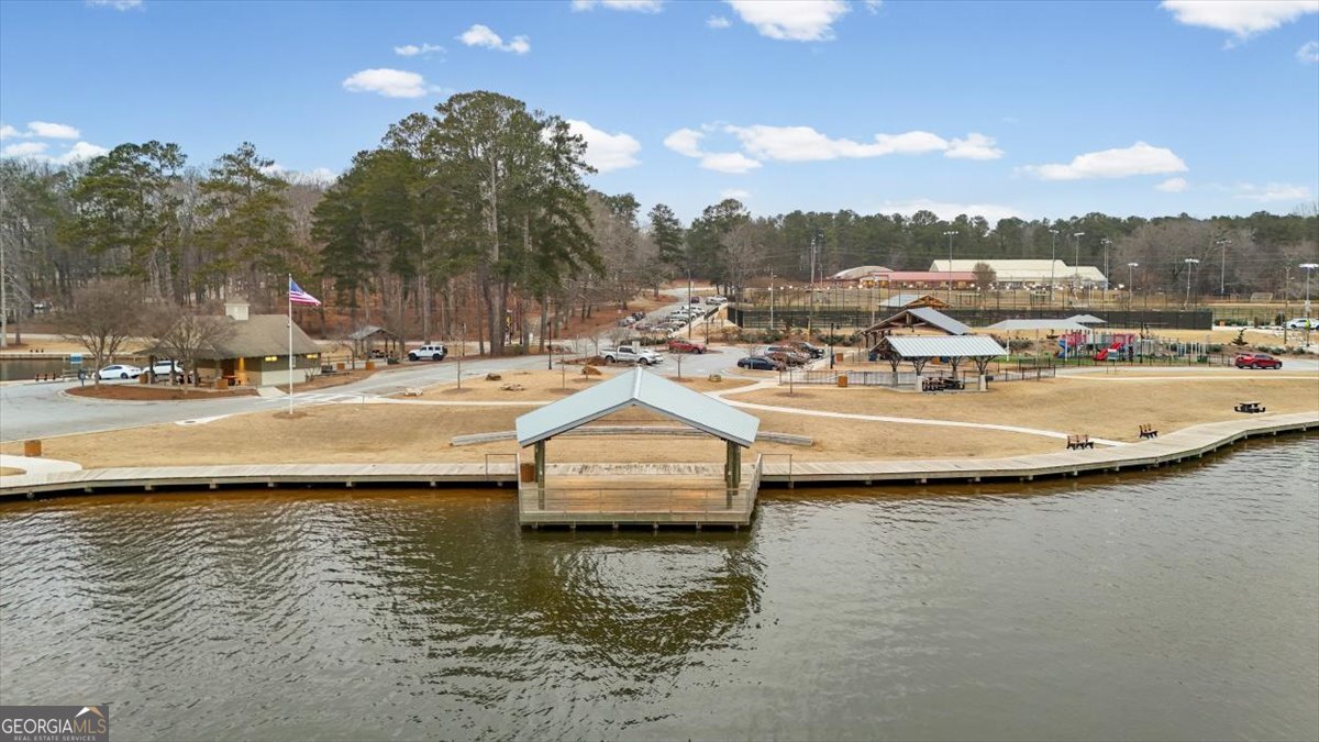 325 Almon Road Carrollton, GA 30117 - Photo 39 of 41 a view of a lake with houses