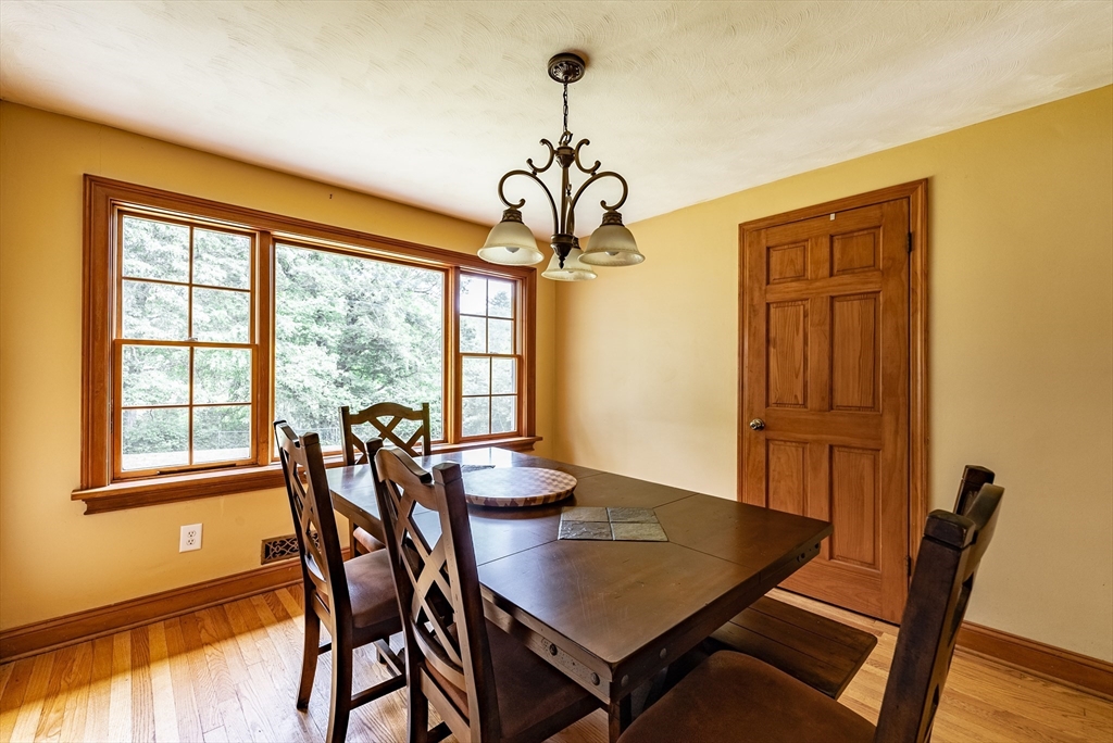 9 Meadowbrook Road Springfield, MA 01128 - Photo 6 of 15 a view of a dining room with furniture window and wooden floor