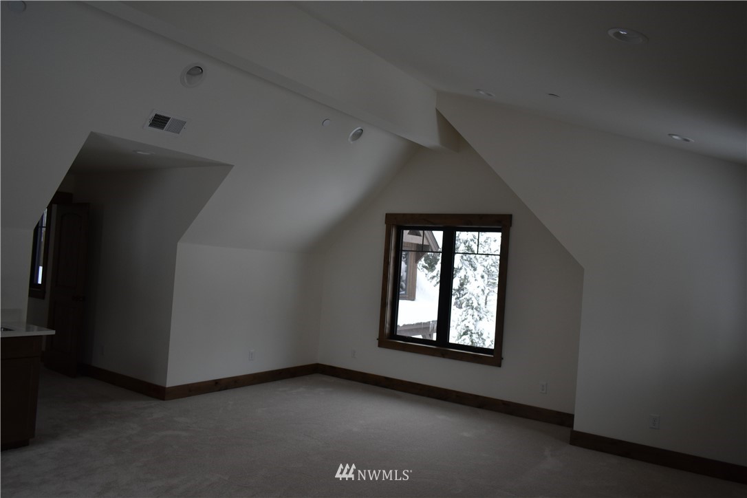 1421 Kokanee Loop Cle Elum, WA 98922 - Photo 14 of 33 an empty room with windows and closet