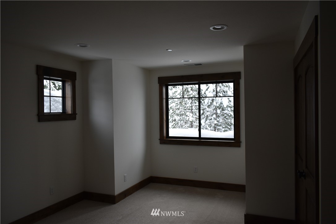 1421 Kokanee Loop Cle Elum, WA 98922 - Photo 16 of 33 a view of an empty room with a window