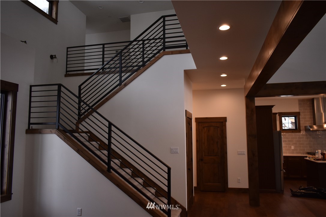 1421 Kokanee Loop Cle Elum, WA 98922 - Photo 27 of 33 a view of entryway and hall with wooden floor
