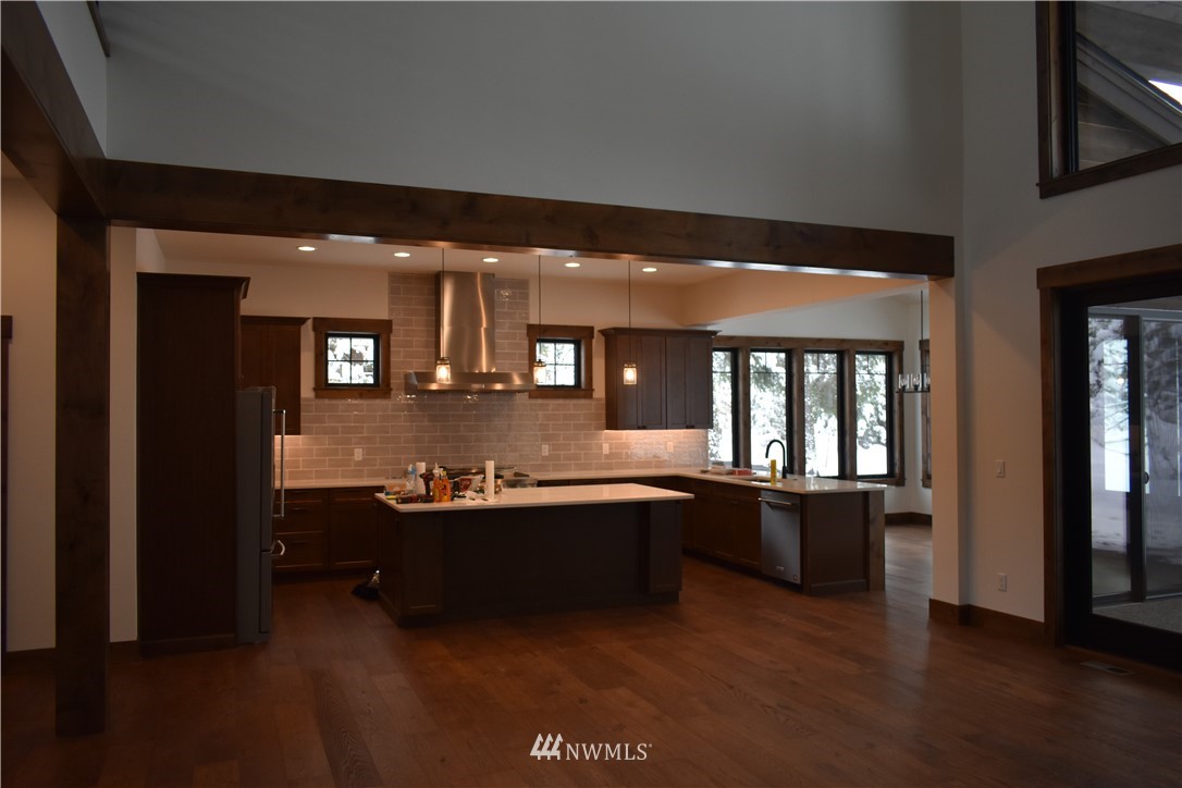 1421 Kokanee Loop Cle Elum, WA 98922 - Photo 7 of 33 wooden floor and kitchen view