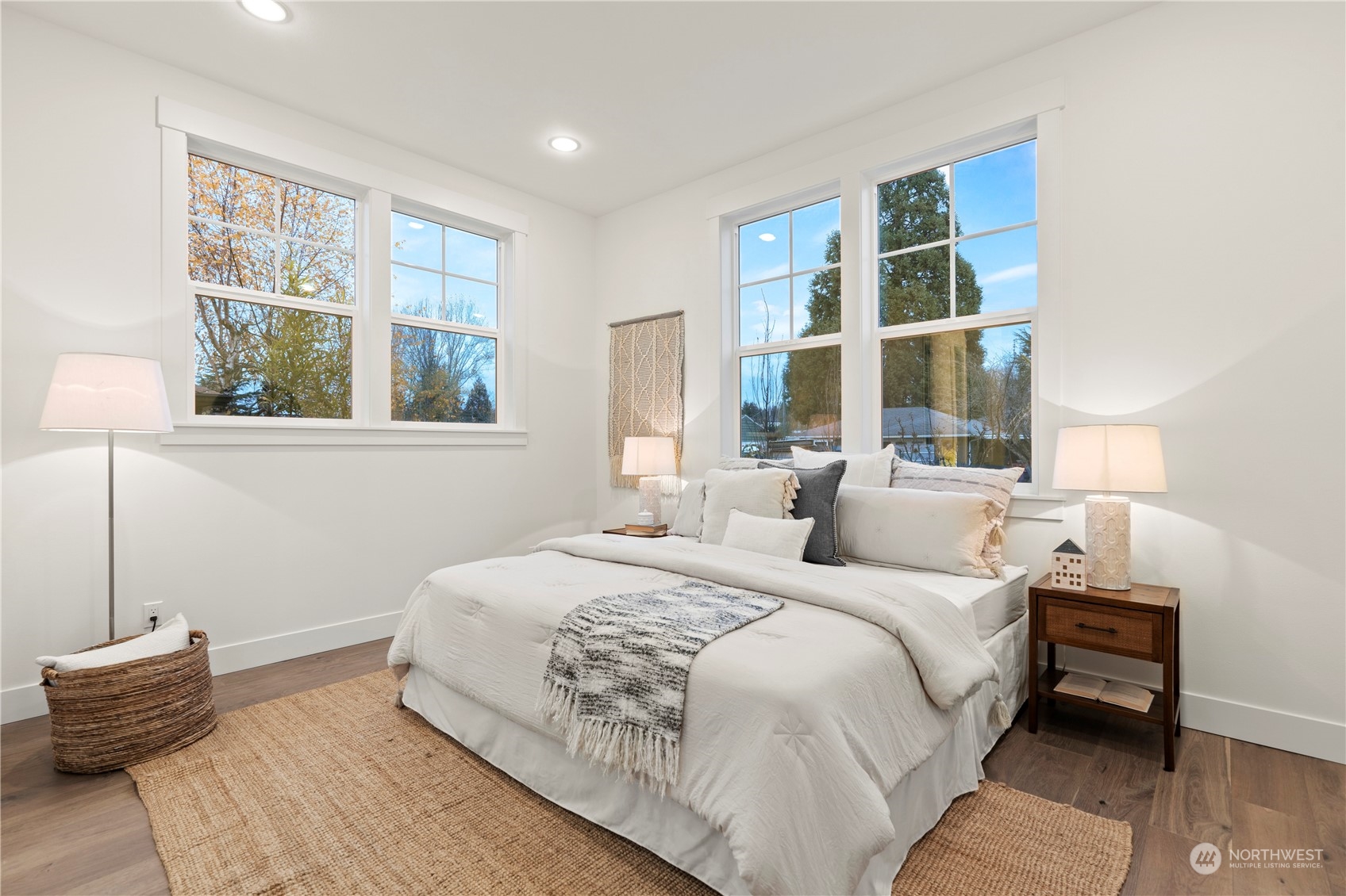 10063 Dibble Avenue Northwest Seattle, WA 98177 - Photo 15 of 35 a bedroom with a bed and a window