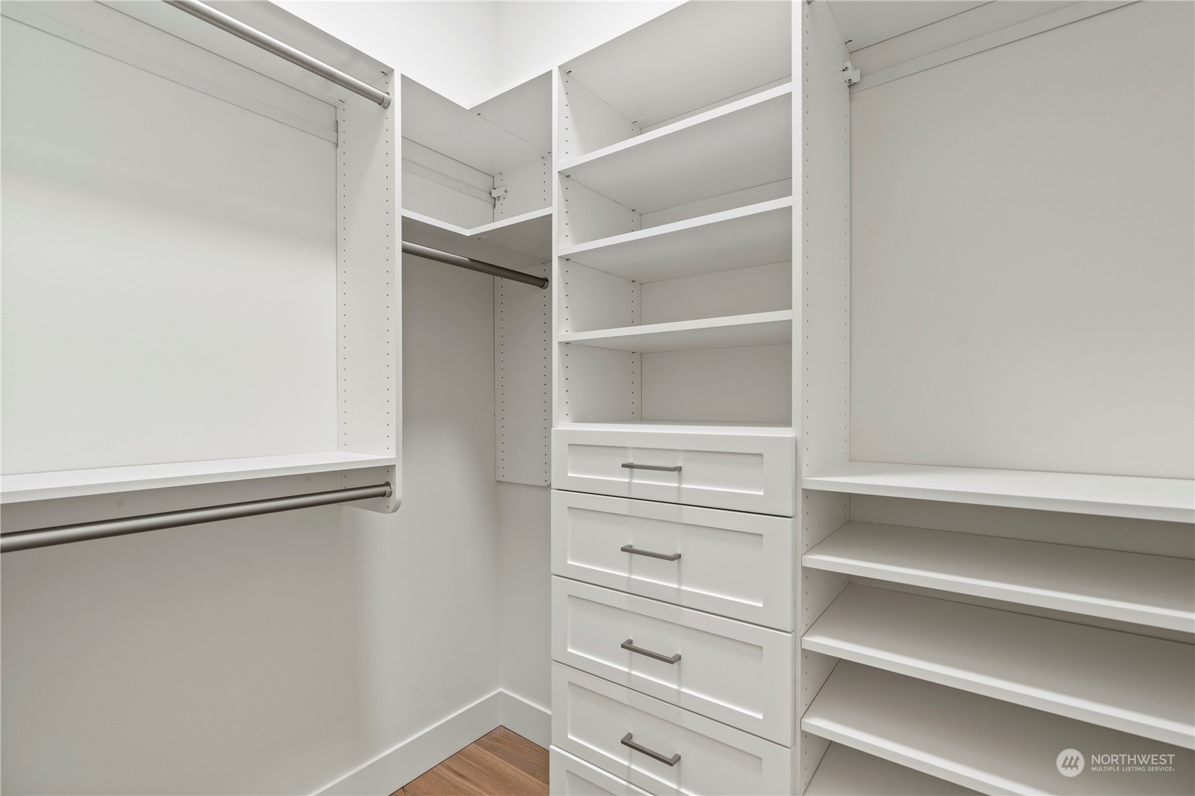 10063 Dibble Avenue Northwest Seattle, WA 98177 - Photo 19 of 35 a view of walk in closet with empty racks