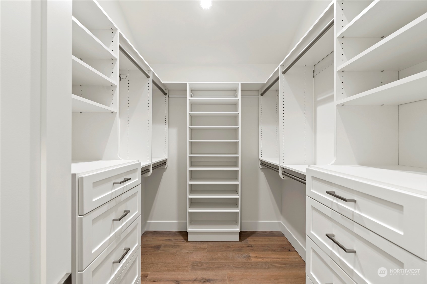 10063 Dibble Avenue Northwest Seattle, WA 98177 - Photo 26 of 35 a view of walk in closet with empty racks