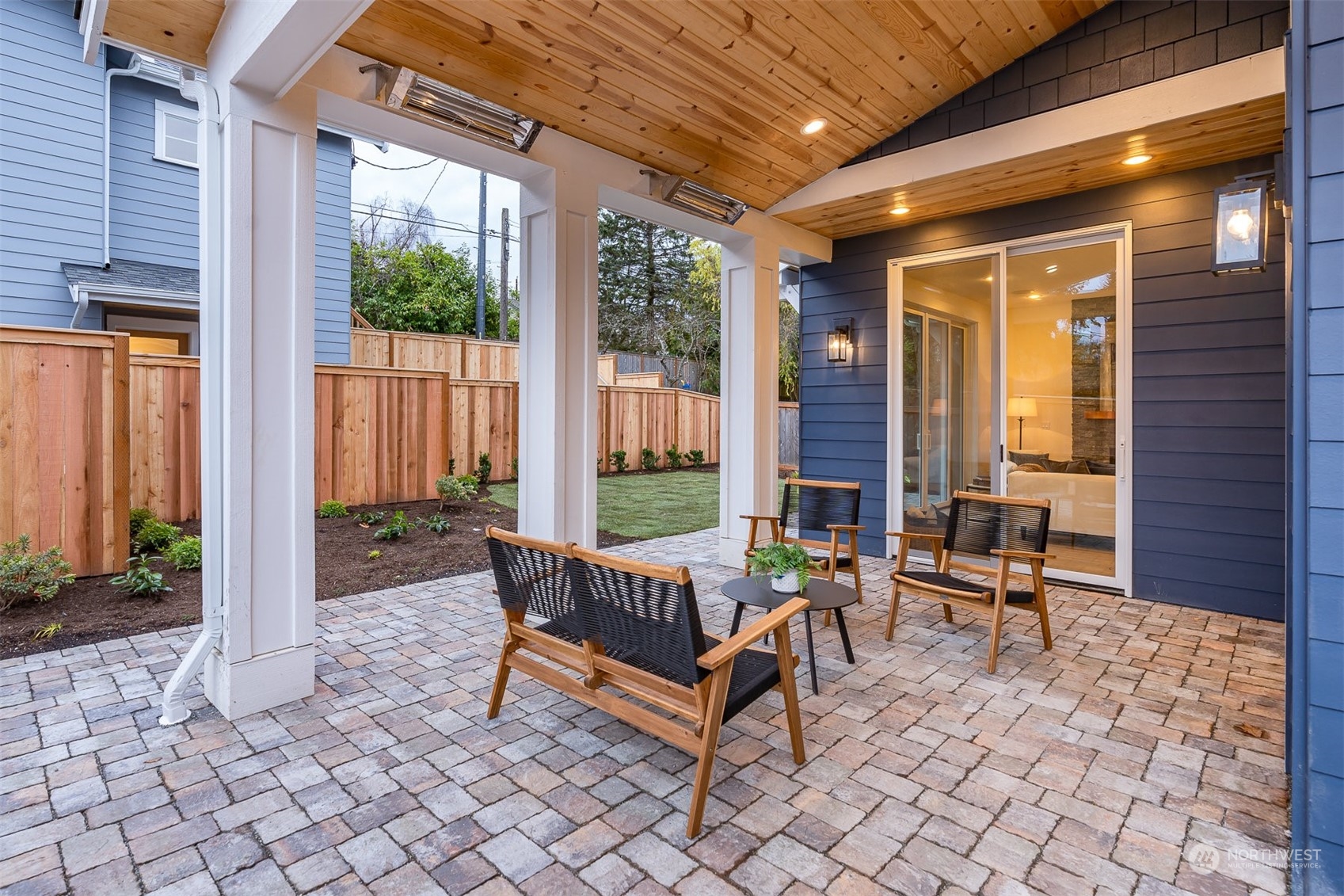 10063 Dibble Avenue Northwest Seattle, WA 98177 - Photo 34 of 35 a building outdoor space with patio furniture and wooden floor