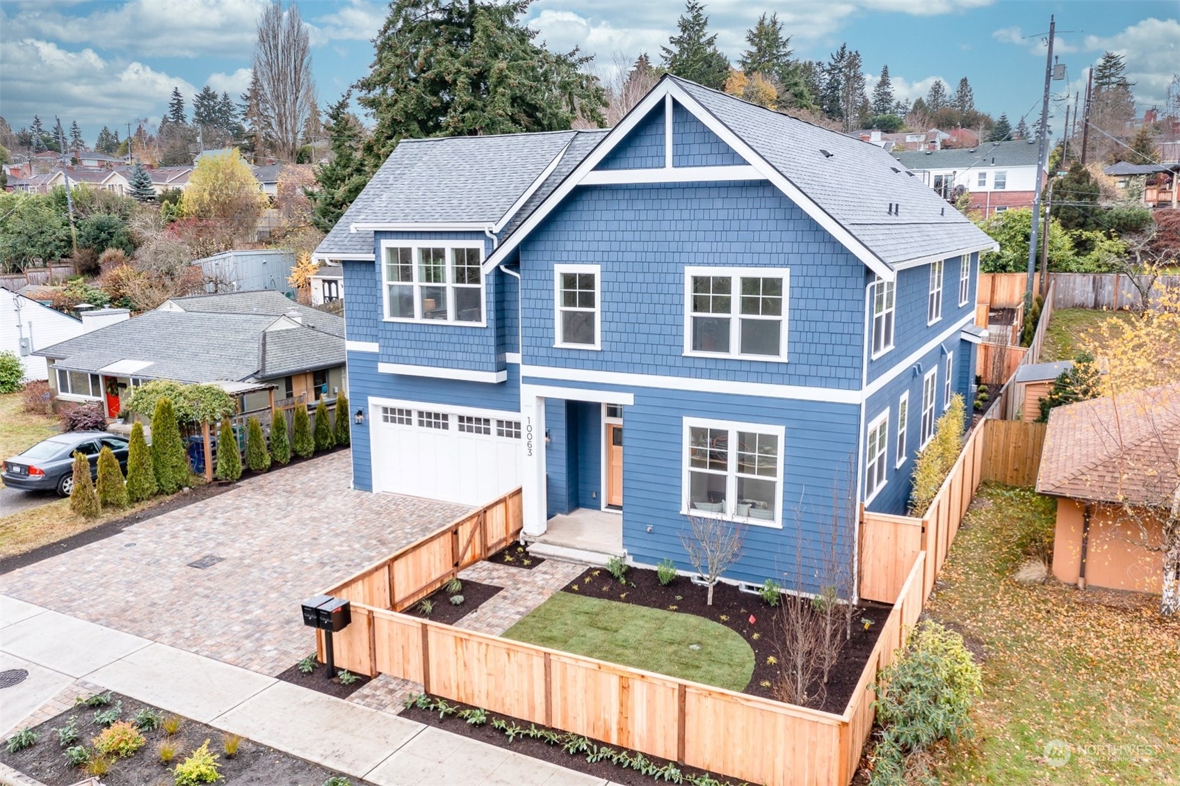 10063 Dibble Avenue Northwest Seattle, WA 98177 - Photo 35 of 35 a front view of a house with garden