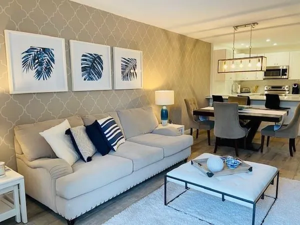 a living room with furniture and a table