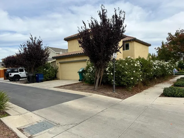 a house view with a garden space