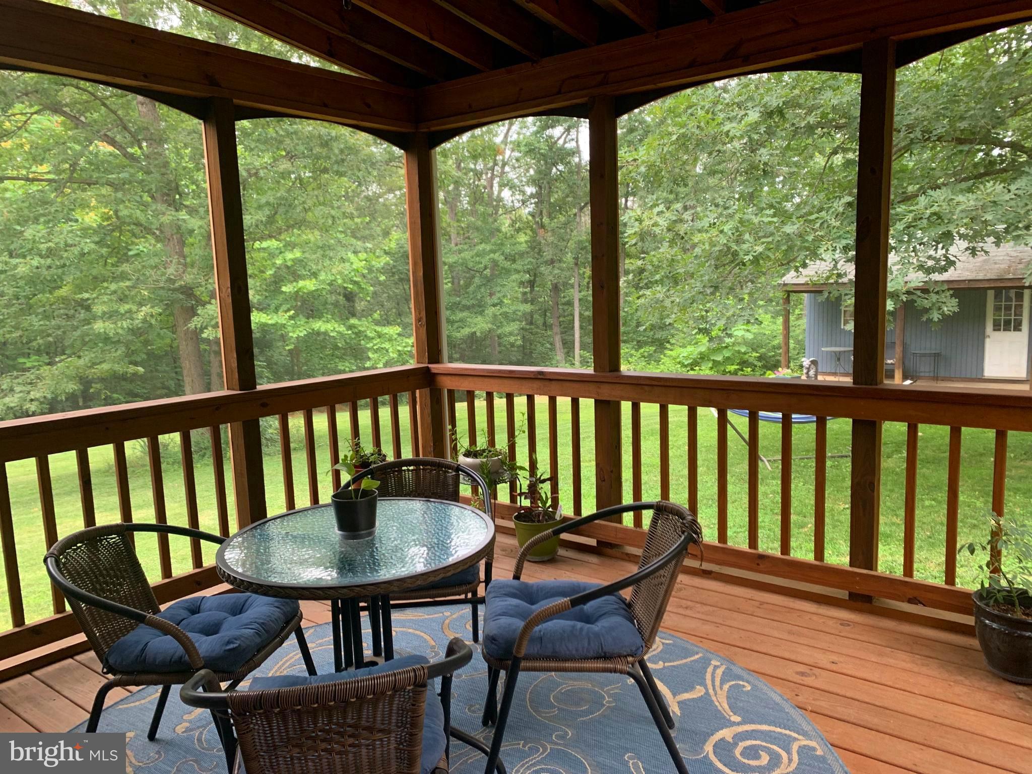 106 Royal Walnut Road Front Royal, VA 22630 - Photo 4 of 46 Enjoy eating dinner on your rear screened porch