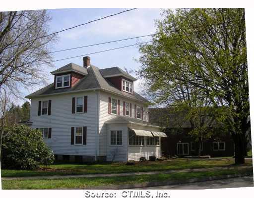 440 Addison Road Glastonbury, CT 06033 - Photo 1 of 1 a front view of a house with a yard