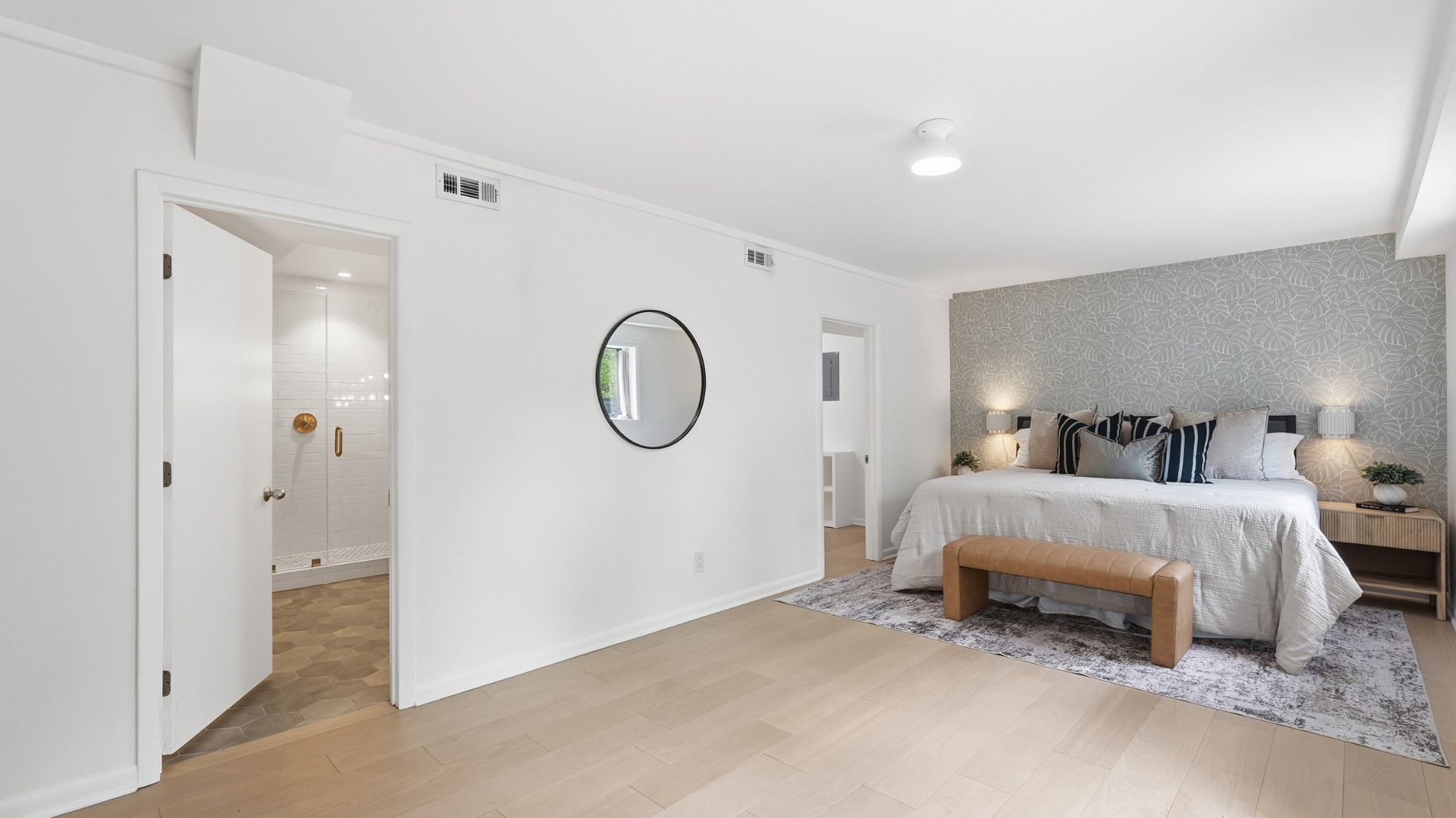 2101 Porter Road Nashville, TN 37216 - Photo 21 of 48 a spacious bedroom with bed and a chandelier