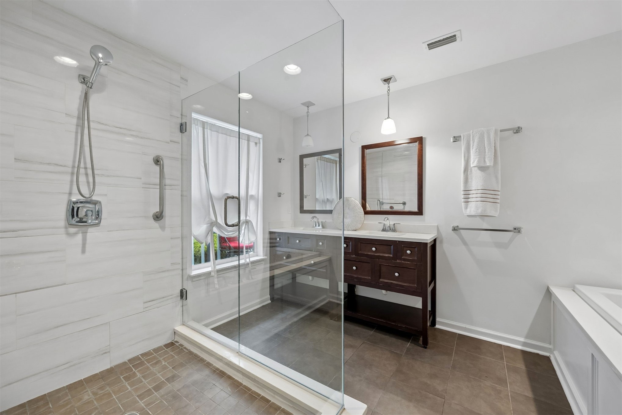 3110 Egans Bluff Road Fernandina Beach, FL 32034 - Photo 13 of 26 The primary bath features a large shower and double vanity.