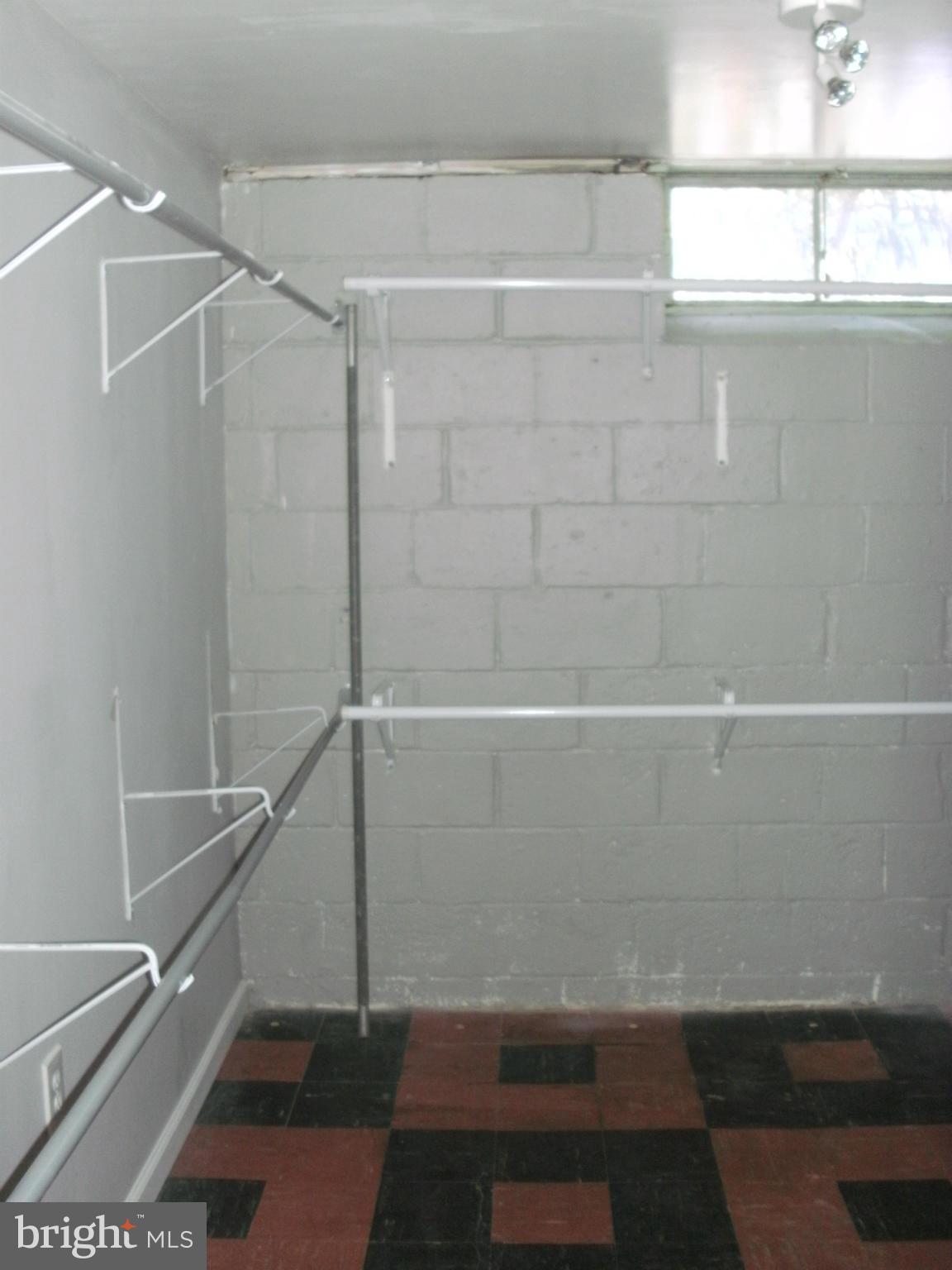8801 Littlewood Road Baltimore, MD 21234 - Photo 15 of 17 a bathroom with a shower