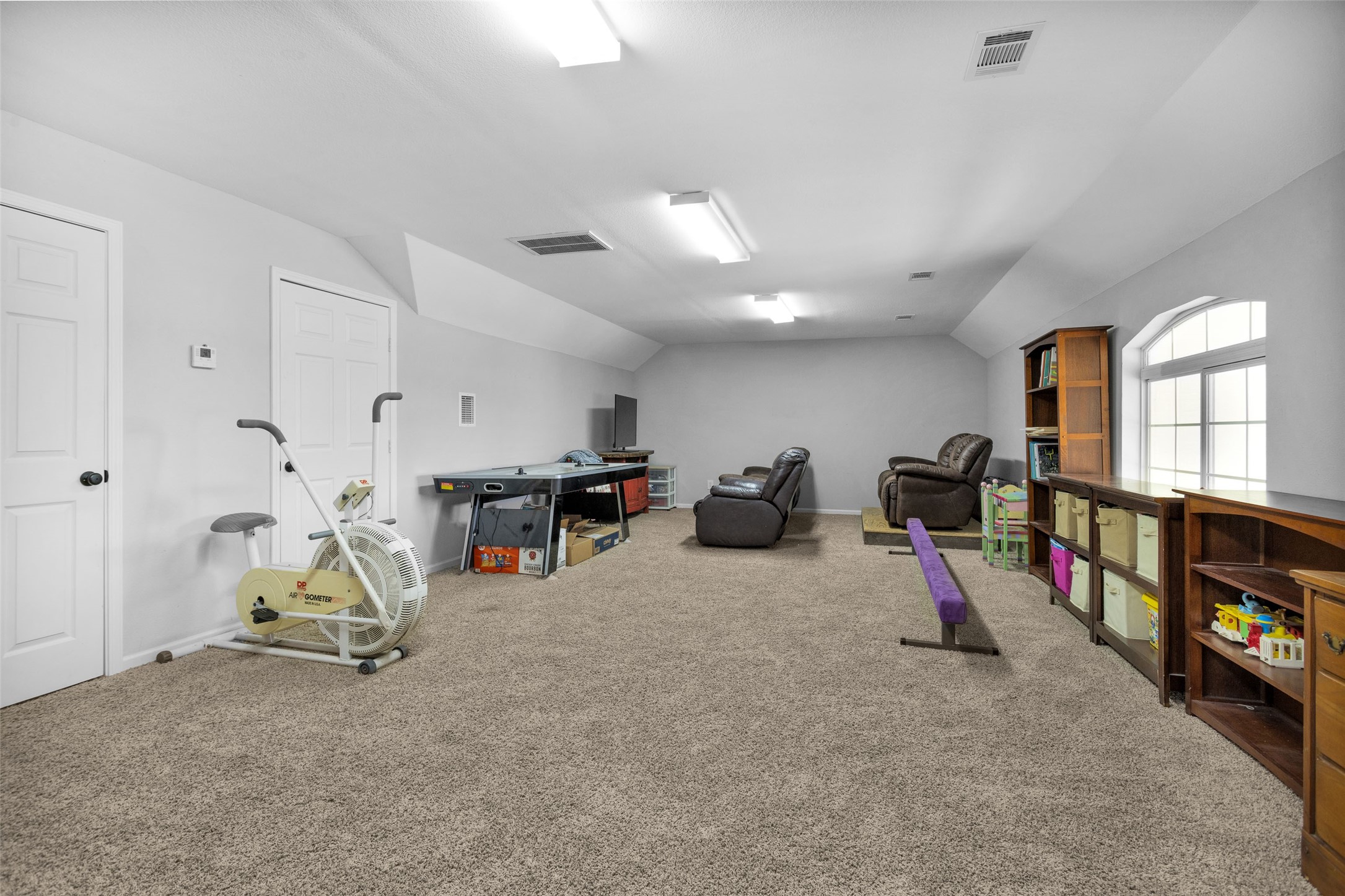 10810 Farrell Road Willis, TX 77378 - Photo 25 of 36 a view of a room with gym equipment