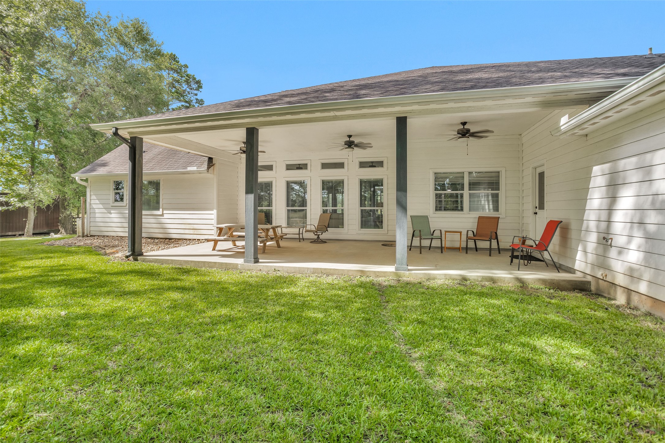 10810 Farrell Road Willis, TX 77378 - Photo 29 of 36 front view of a house with a yard