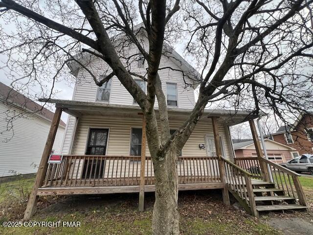 114 North Higgins Avenue Sayre, PA 18840 - Photo 2 of 21 front view of a house with a large tree