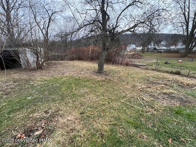 114 North Higgins Avenue Sayre, PA 18840 - Photo 7 of 21 a fire hydrant in the middle of a field