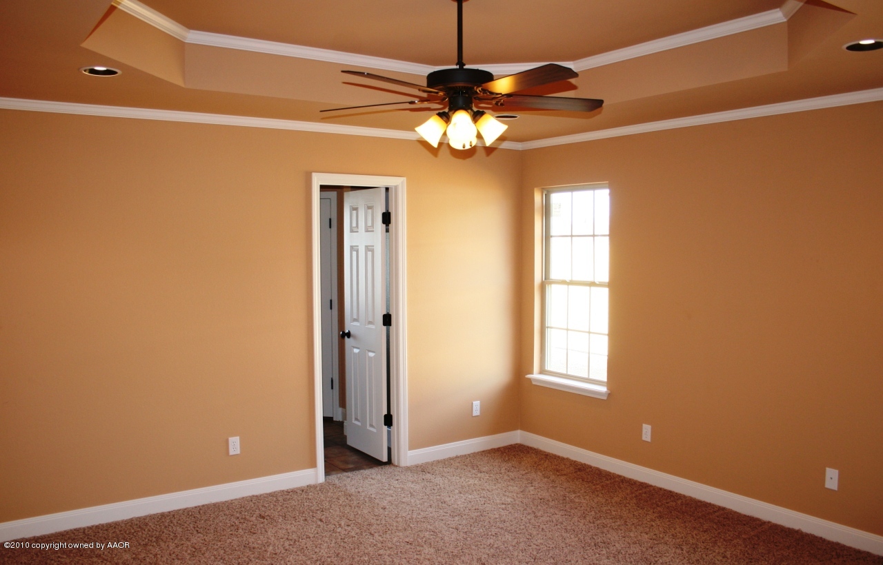 5804 South Rusk Street Amarillo, TX 79118 - Photo 7 of 18 a view of an empty room with a window
