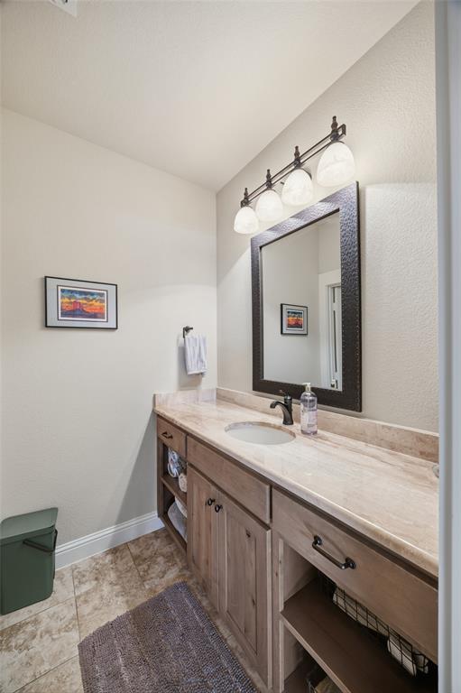3105 Pastor Street Dallas, TX 75212 - Photo 21 of 28 Bathroom featuring vanity and baseboards