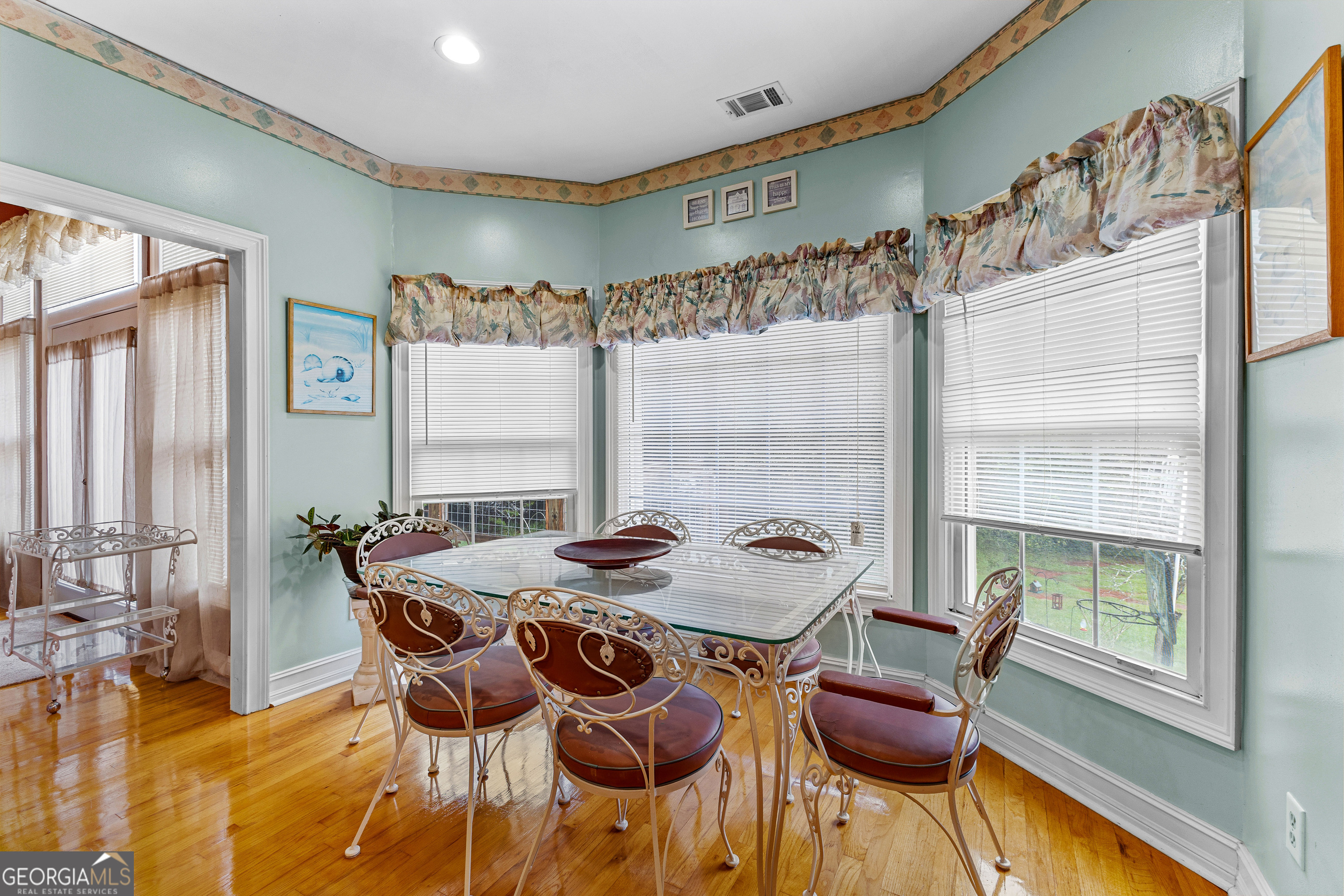 502 North Rover Road Williamson, GA 30292 - Photo 12 of 42 a dining room with furniture and window