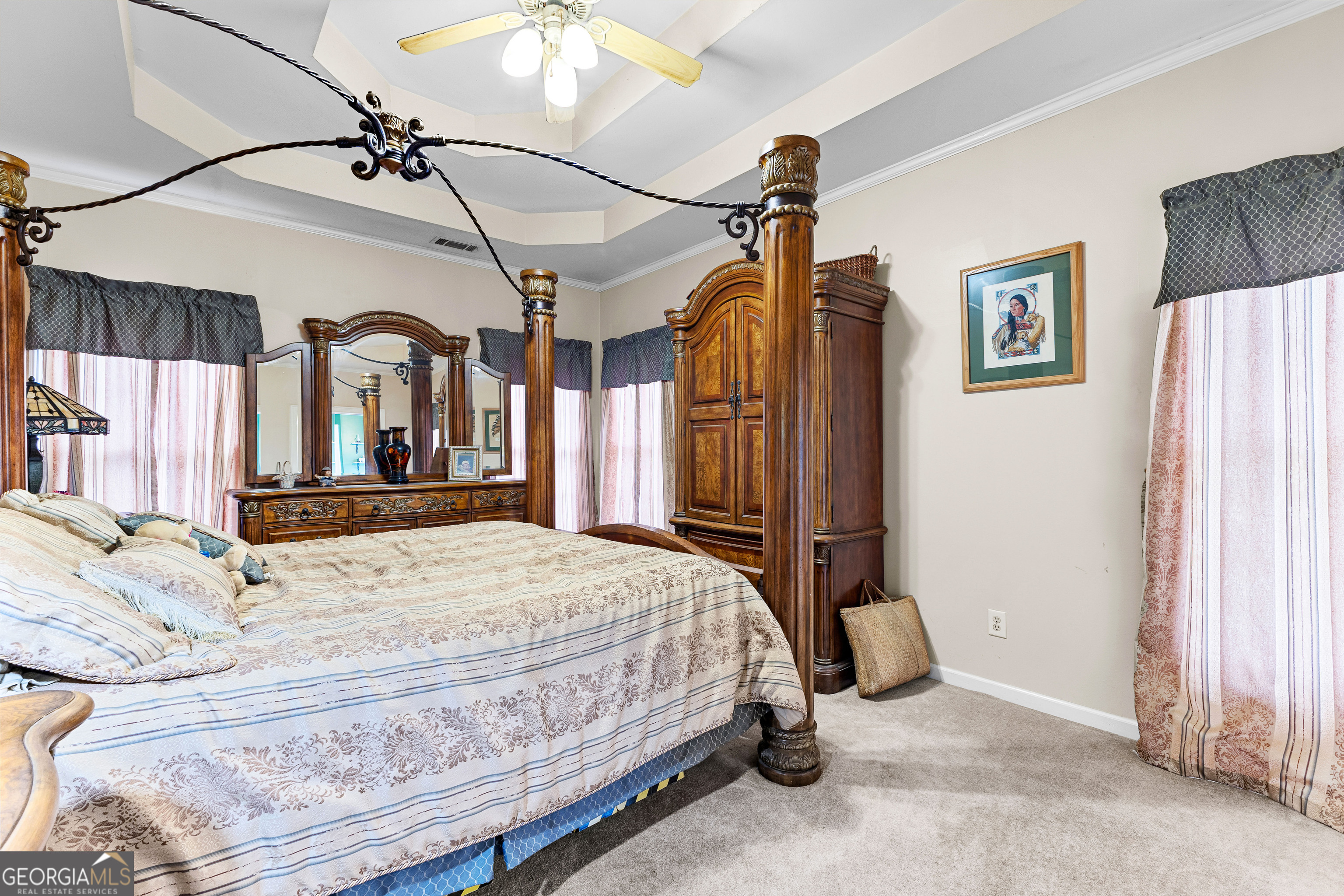 502 North Rover Road Williamson, GA 30292 - Photo 15 of 42 a bedroom with a bed and a mirror