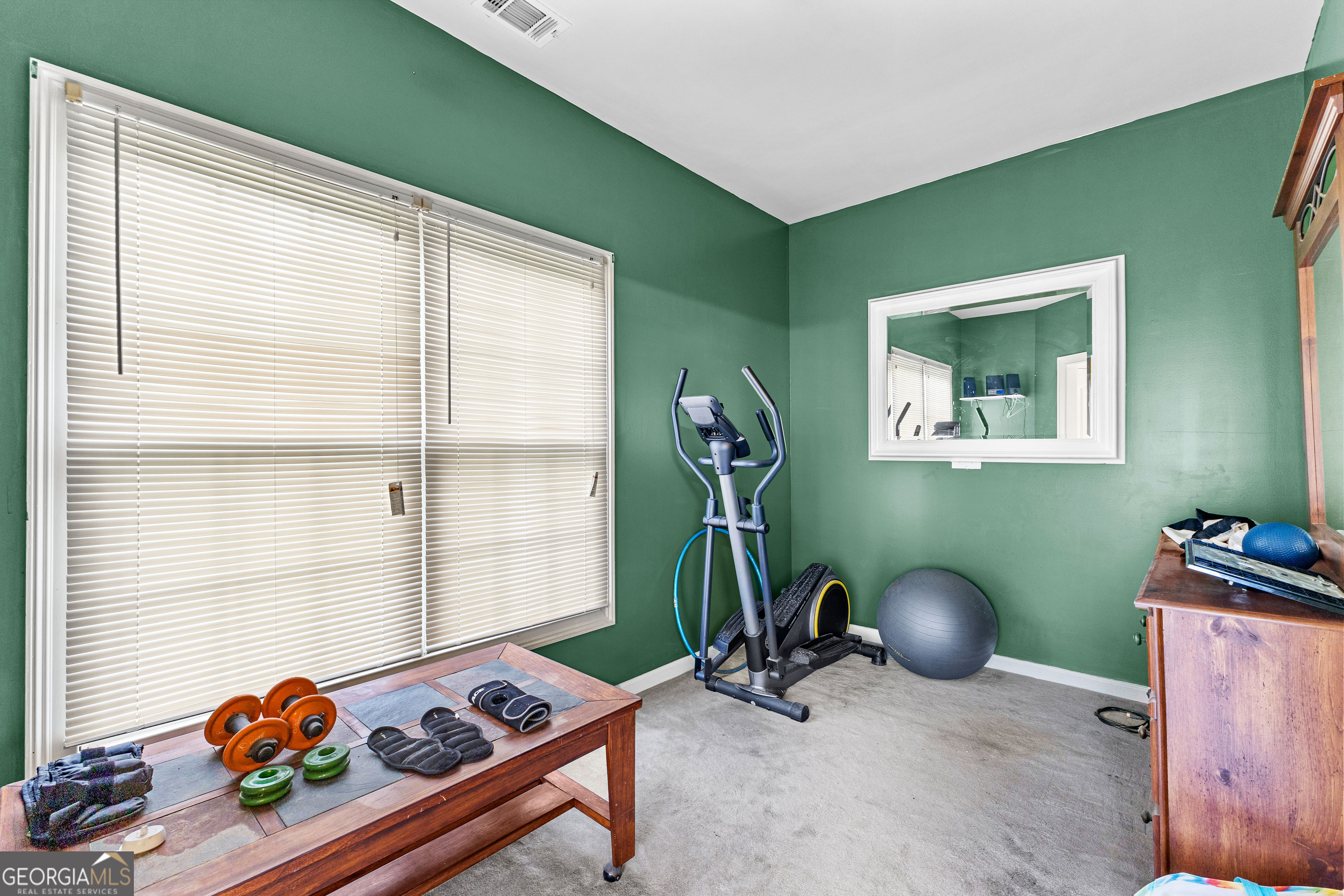 502 North Rover Road Williamson, GA 30292 - Photo 17 of 42 a living room with furniture and a window