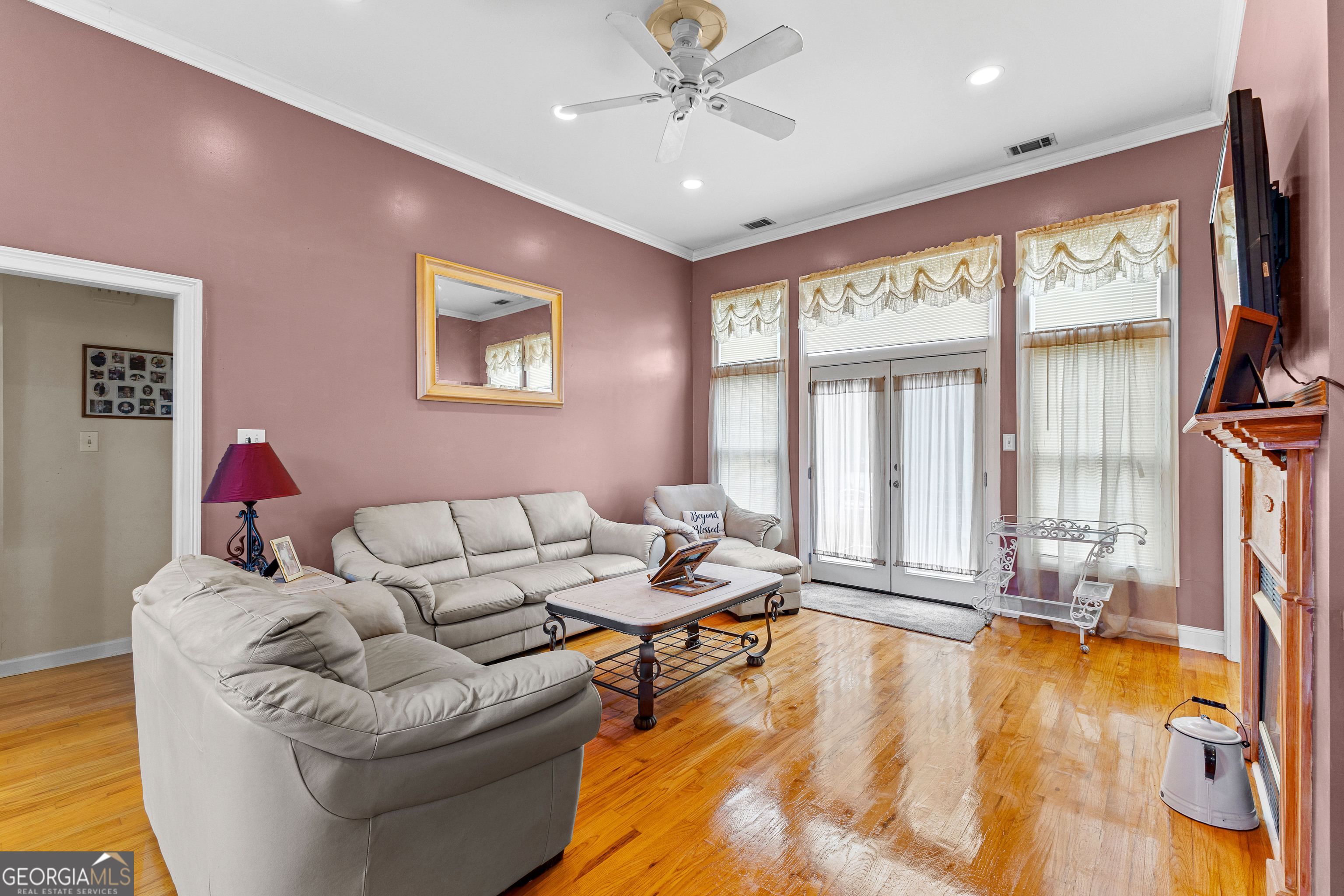 502 North Rover Road Williamson, GA 30292 - Photo 19 of 42 a living room with furniture and floor to ceiling window