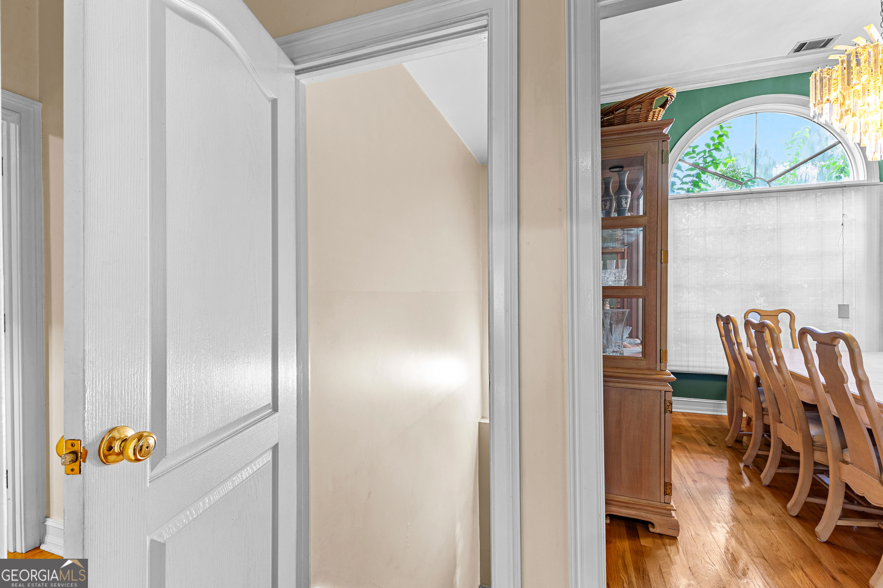 502 North Rover Road Williamson, GA 30292 - Photo 26 of 42 a view of dining room with furniture and wooden floor
