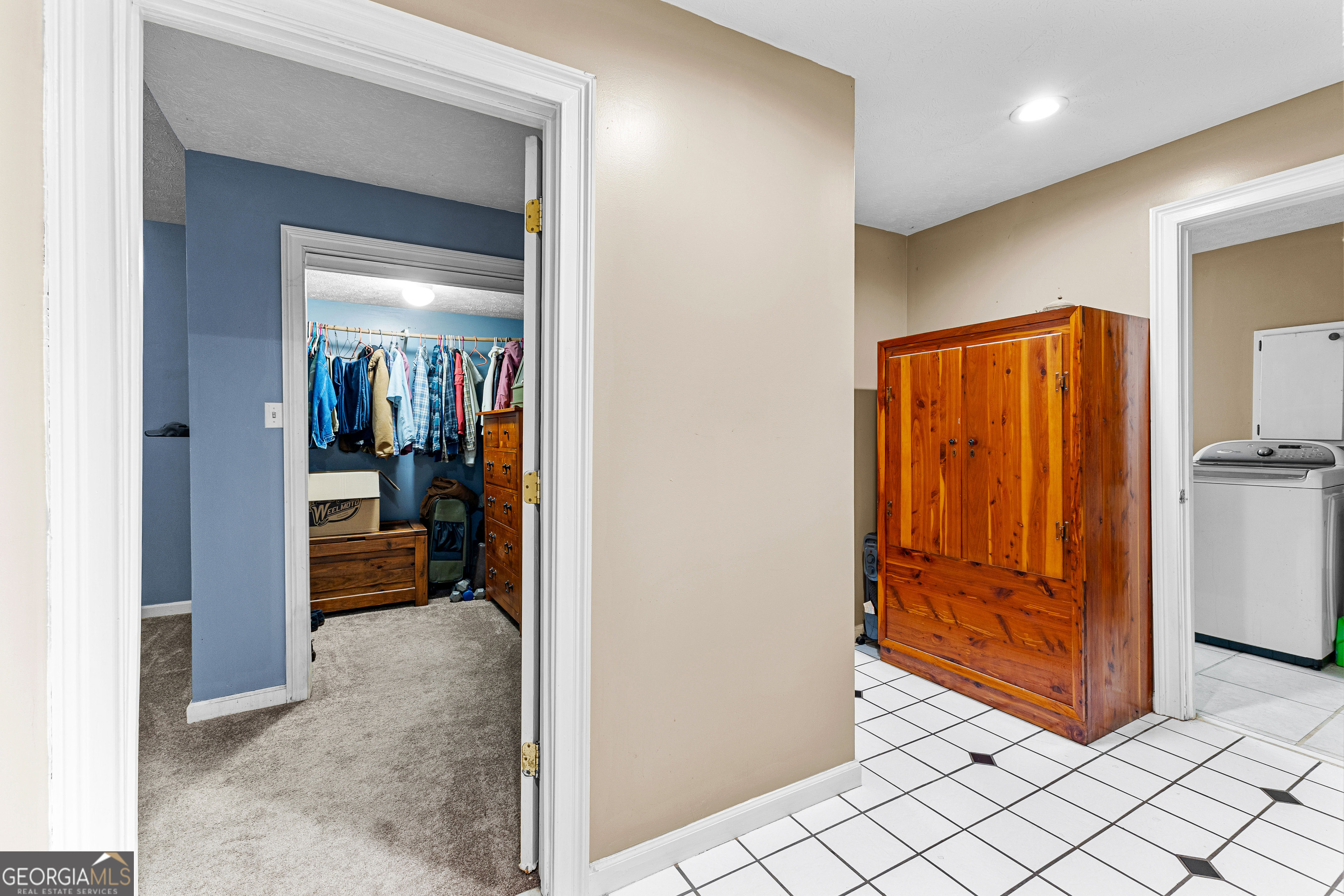 502 North Rover Road Williamson, GA 30292 - Photo 28 of 42 a view of a hallway and a livingroom with furniture