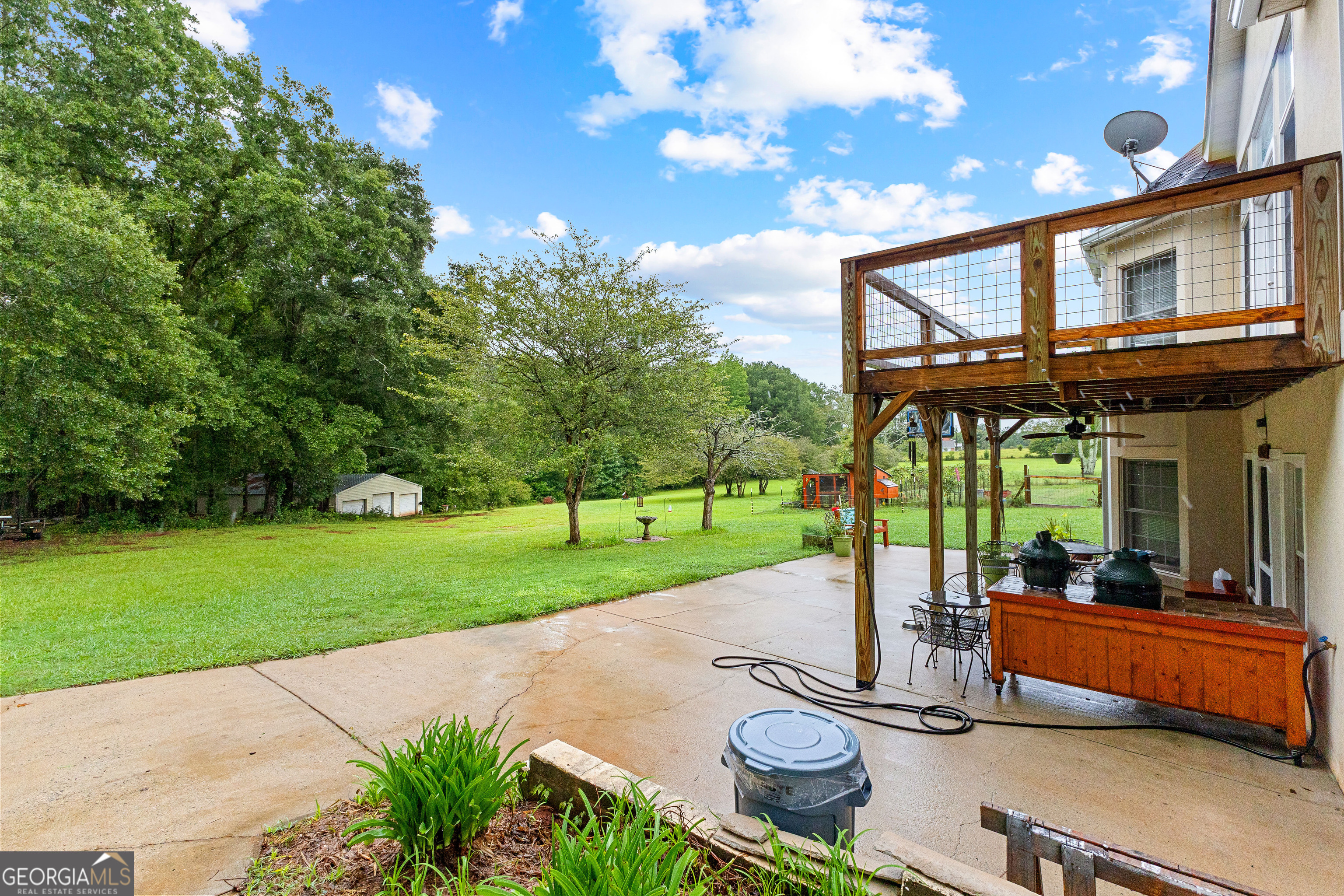 502 North Rover Road Williamson, GA 30292 - Photo 35 of 42 a view of a patio with a table and chairs