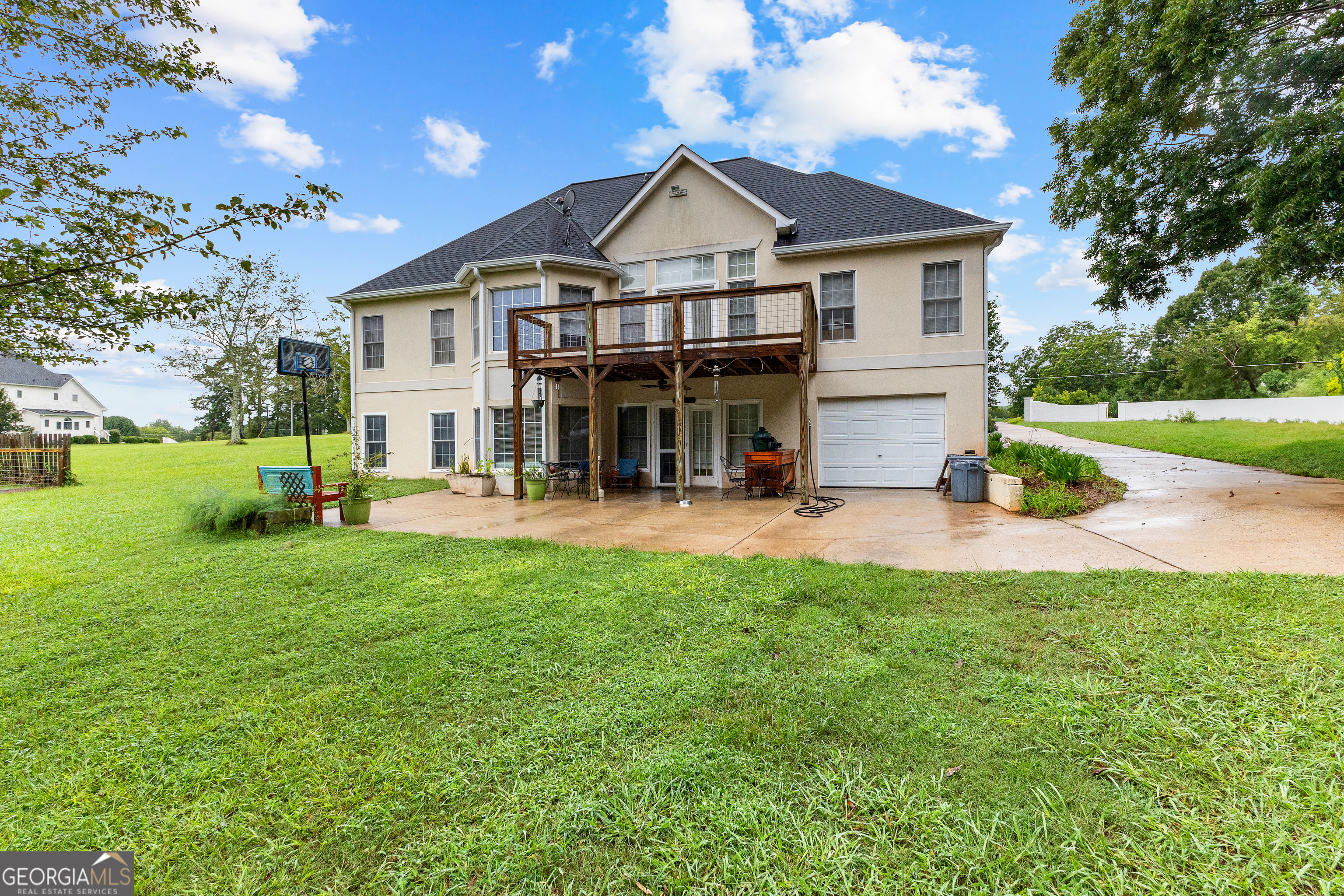 502 North Rover Road Williamson, GA 30292 - Photo 36 of 42 a view of a house with a yard patio and fire pit