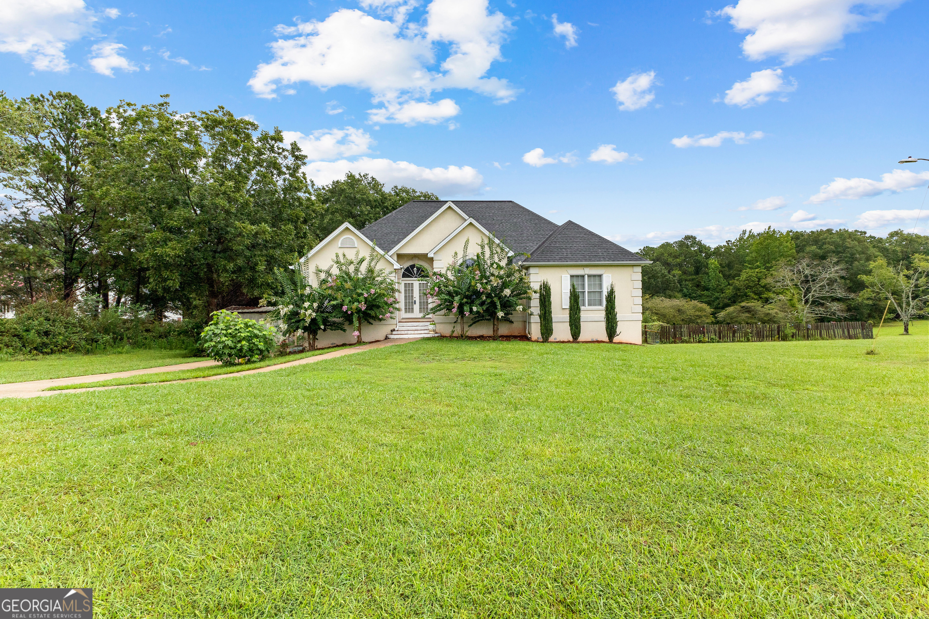 502 North Rover Road Williamson, GA 30292 - Photo 42 of 42 a front view of a house with yard and green space