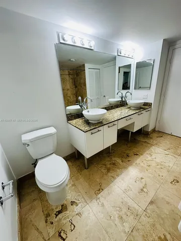a bathroom with a sink and a toilet