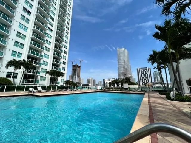 a view of a swimming pool and outdoor space