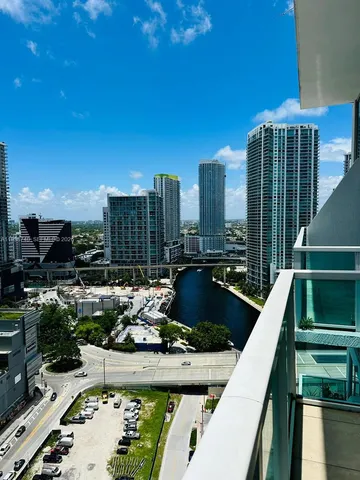 a view of swimming pool from a balcony