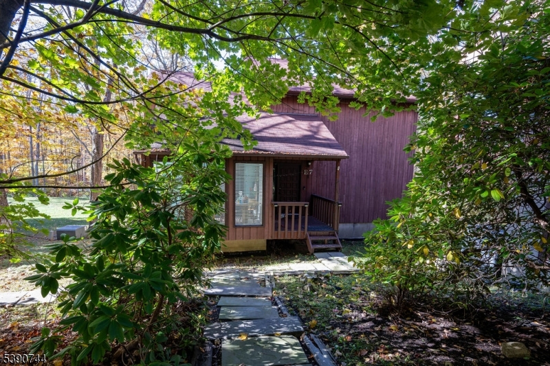 13 Village Way, Unit E7 Vernon, NJ 07462 - Photo 2 of 46 a front view of a house with garden
