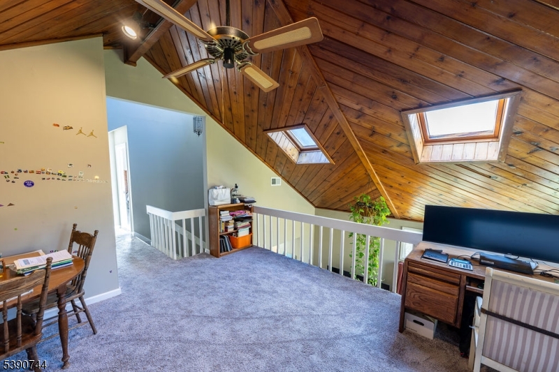 13 Village Way, Unit E7 Vernon, NJ 07462 - Photo 23 of 46 a livingroom with furniture and stairs