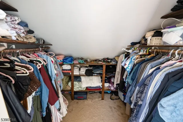 a view of a storage & utility room with washer and dryer
