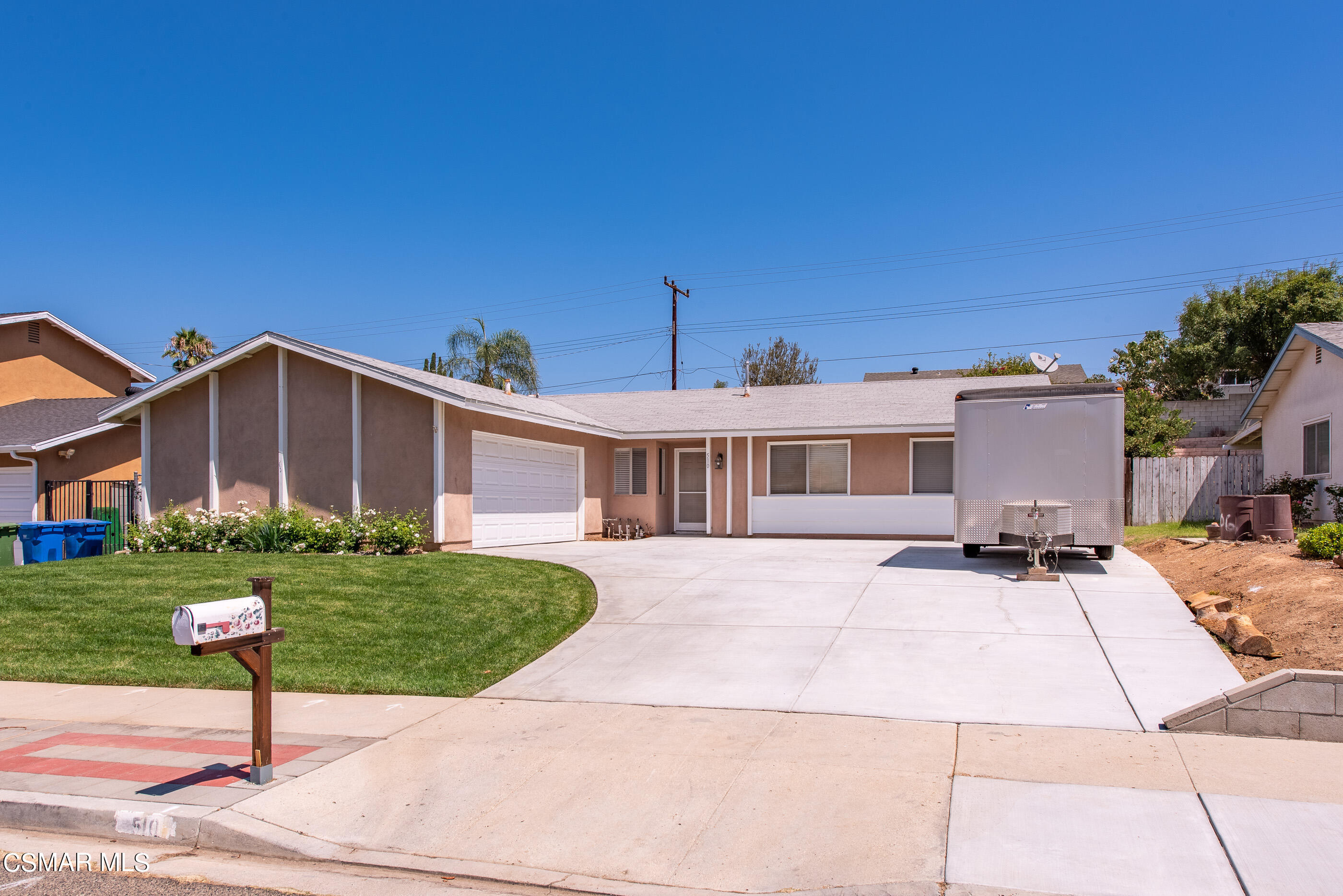 510 Appleton Road Simi Valley, CA 93065 - Photo 1 of 25 a front view of a house with a yard and garage