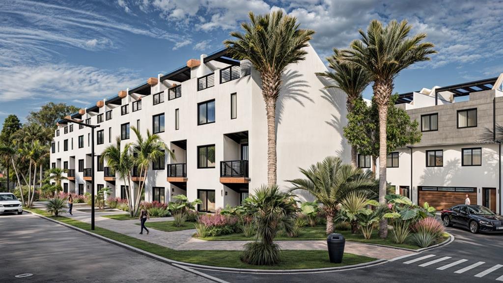 10775 Rodeo Drive, Unit MODEL Lakewood Ranch, FL 34202 - Photo 4 of 12 a view of a building with a palm tree