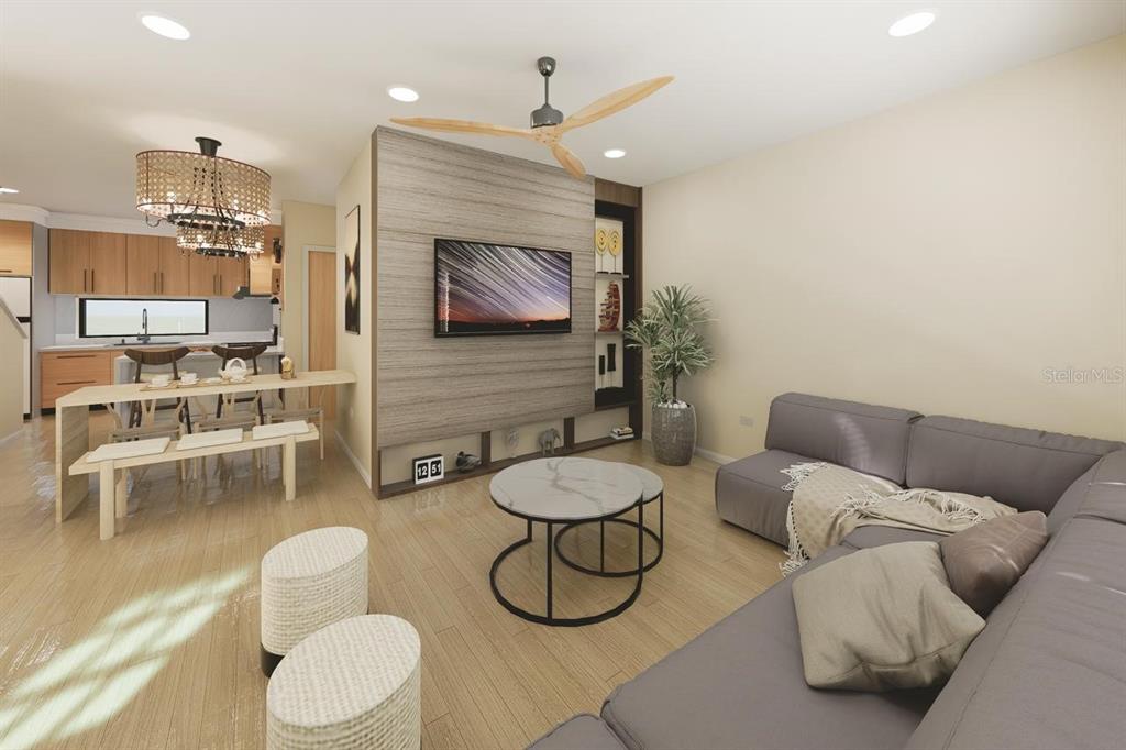 10775 Rodeo Drive, Unit MODEL Lakewood Ranch, FL 34202 - Photo 5 of 12 a living room with furniture a rug and white walls