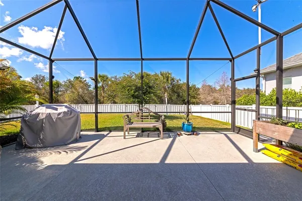 a view of swimming pool with a patio