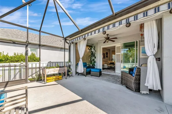 a view of a swimming pool with a porch