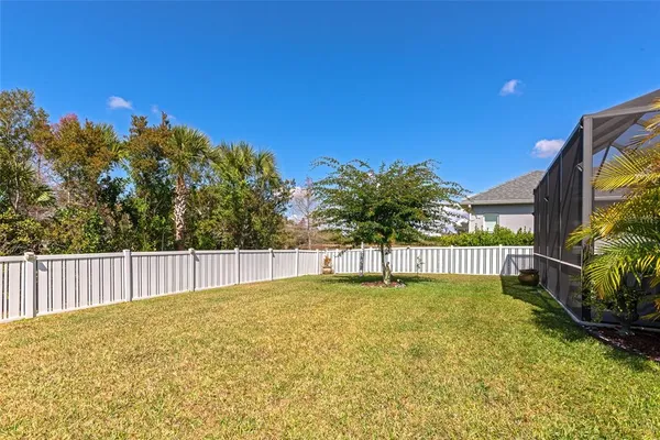 a swimming pool with wooden fence