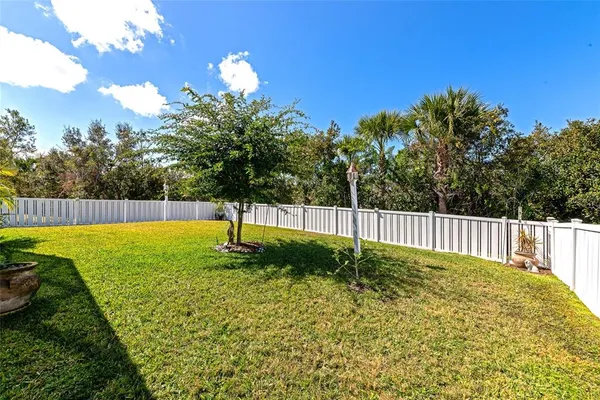 a swimming pool with wooden fence